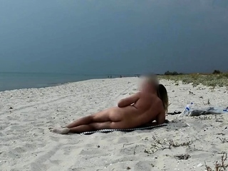 Amateur Nudist MILF Has Doggy-Style Fun at the Beach